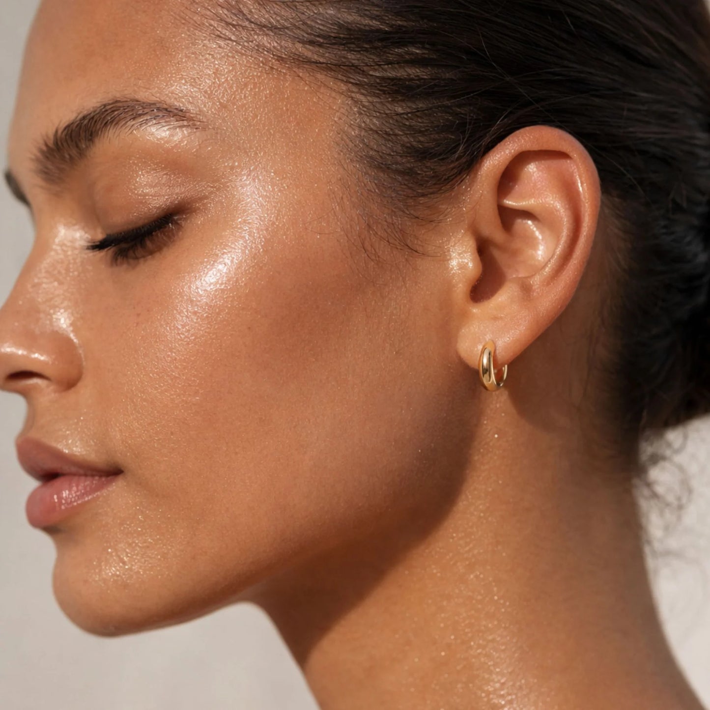 Corinne Elongated Dome Huggie Hoop